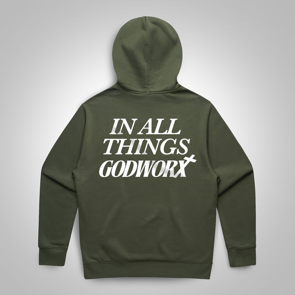 Green hoodie with 'IN ALL THINGS GODWORX' text on the back against a gray background