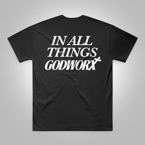 Black christian t-shirt with 'IN ALL THINGS GODWORX' text on a white background