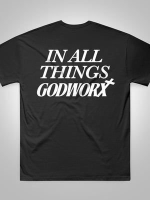 Black christian t-shirt with 'IN ALL THINGS GODWORX' text on a white background