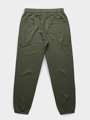 back image of green christian sweatpants on a white background