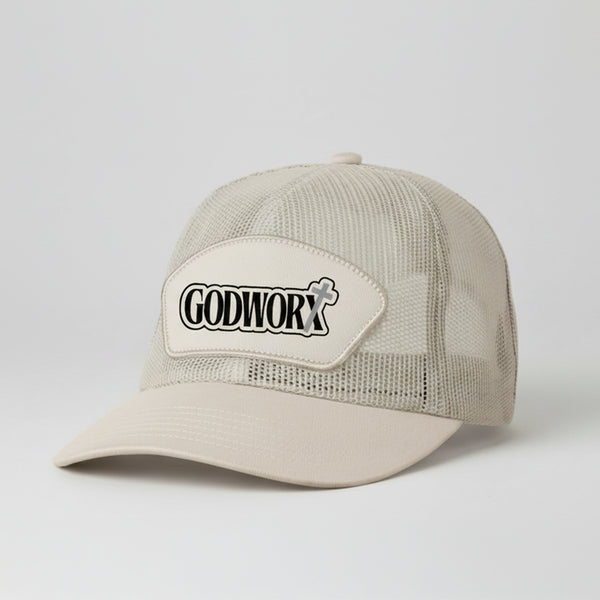 Khaki trucker cap with 'GODWORX' logo on a light gray background
