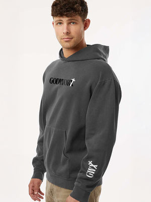 man wearing a christian hoodie with a godworx logo on the chest and gwx logo on the lower sleeve